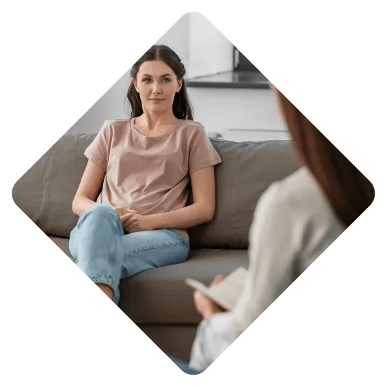 Woman sharing her concerns with a counsellor during a therapy session